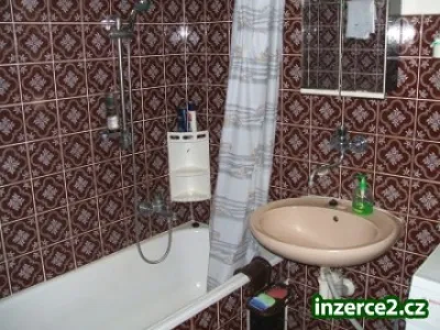 Zděný řadový dům se zahradou!