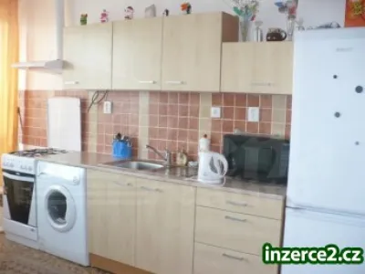Zrekonstruovaný, zděný byt 2+kk v OV s lodžií a garáží