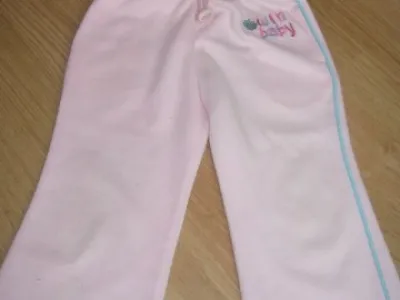 Růžové tepláky vel98